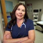 Nurse standing in doorway