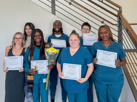 healthcare workers showing certificates